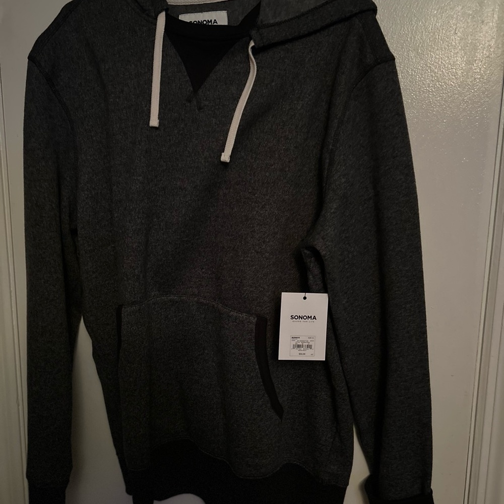New with tags black fleece sweater with hoodie